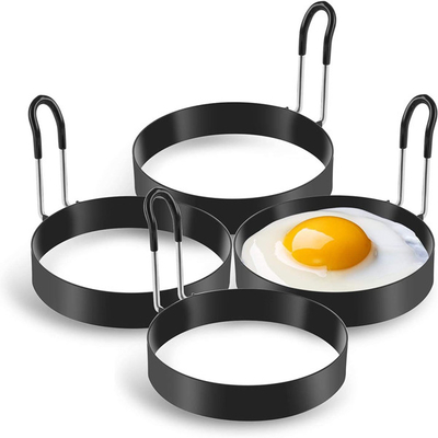 Uovo rotondo nero di acciaio inossidabile che cucina gli anelli moderni