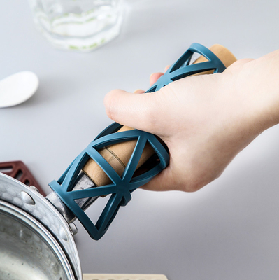 Strumento multifunzionale della cucina di calore di esagono delle stuoie di treppiedi del silicone e dei cuscinetti caldi per le stuoie della ciotola