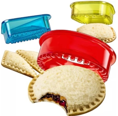 Gli strumenti della cucina agglutinano la taglierina ed il sigillatore del panino del pranzo del biscotto del creatore DIY