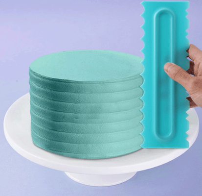 Le ruspe spianatrici del dolce hanno messo lo strumento di plastica del dolce DIY della crema del burro del lucidatore della ruspa spianatrice del dente di sega