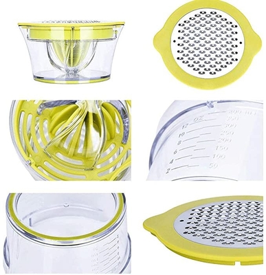 La cucina in serie manuale fornisce agli spremiagrumi arancio dello spremitoio del limone la grattugia della tazza di misurazione