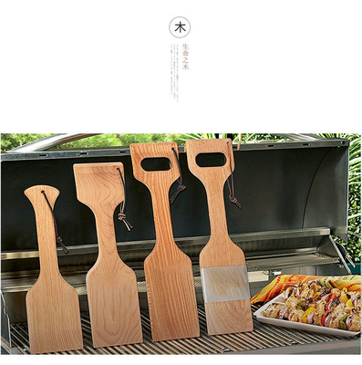Gli strumenti e gli accessori di legno naturali liberi del BARBECUE della setola grigliano la ruspa spianatrice