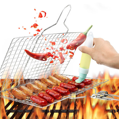 Strumenti ed accessori del BARBECUE di acciaio inossidabile ISO9001 che piegano il canestro della griglia con la maniglia