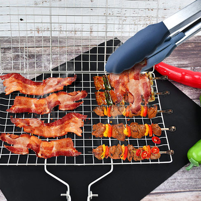 Strumenti ed accessori del BARBECUE di acciaio inossidabile ISO9001 che piegano il canestro della griglia con la maniglia