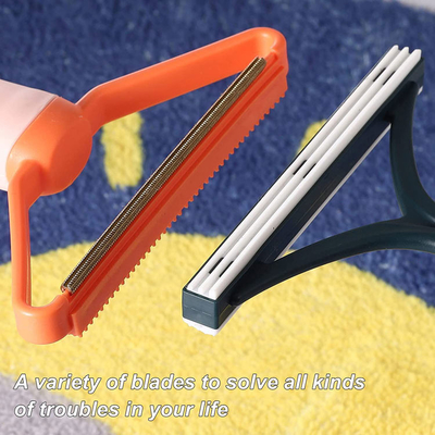 Il metallo di plastica portatile sradica il rullo del dispositivo di rimozione dei capelli dei vestiti della polvere del residuo di stoffa per il tappeto dello strato