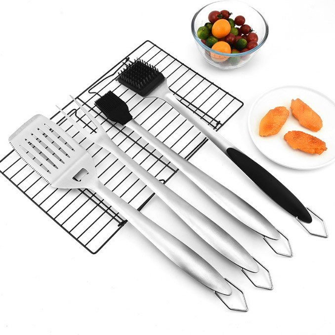 Gli strumenti e gli accessori resistenti del BARBECUE hanno messo grigliando per il cortile all'aperto